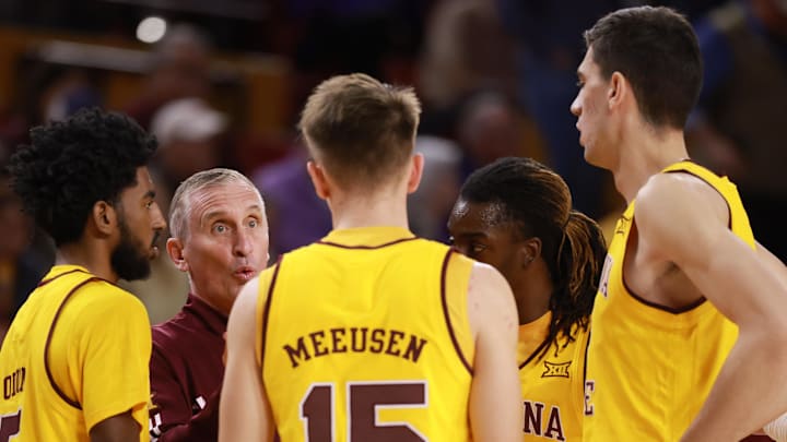 Jan 10, 2026; Tempe, Arizona, USA; Arizona State Sun Devils head coach Bobby Hurley in the huddle with his players against the Kansas State Wildcats in the first half at Desert Financial Arena. Mandatory Credit: Mark J. Rebilas-Imagn Images Jan 10, 2026; Tempe, Arizona, USA; Arizona State Sun Devils head coach Bobby Hurley in the huddle with his players against the Kansas State Wildcats in the first half at Desert Financial Arena. Mandatory Credit: Mark J. Rebilas-Imagn Images