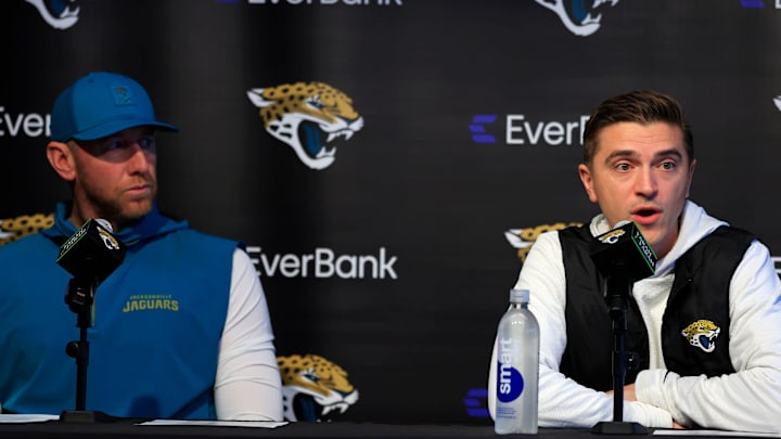 Jacksonville Jaguars general manager James Gladstone, right, speaks as head coach Liam Coen looks on during a press conference at the Miller Electric Center, Wednesday, Jan. 14, 2026, in Jacksonville, Fla.