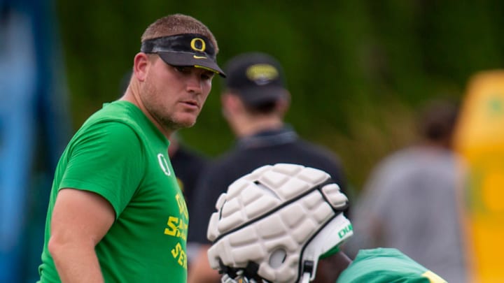 Oregon defensive coordinator Tosh Lupoi watches over practice with the Ducks Wednesday, Aug. 17, 2022, in Eugene, Ore.

Lupoi