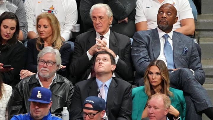 Jun 1, 2023; Denver, CO, USA; Miami Heat owner Micky Arison (middle left), president Pat Riley (top center), and vice president of player programs Alonzo Mourning (center right) attend game one of the 2023 NBA Finals against the Denver Nuggets at Ball Arena. Mandatory Credit: Kyle Terada-Imagn Images