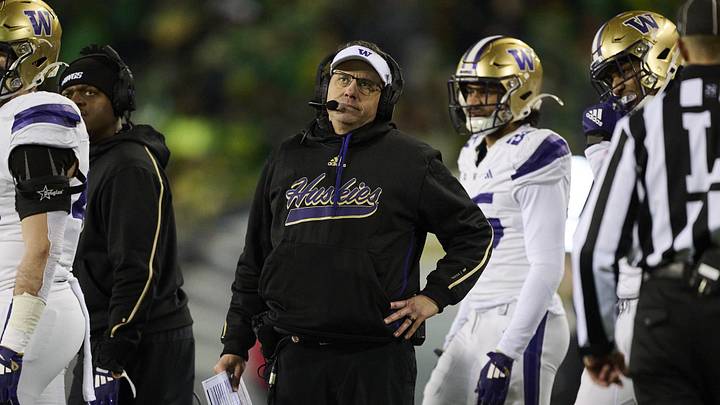 Nov 30, 2024; Eugene, Oregon, USA; Washington Huskies head coach Jedd Fisch walks out to the field during a time out during the second half against the Oregon Ducks at Autzen Stadium. Mandatory Credit: Troy Wayrynen-Imagn Images Nov 30, 2024; Eugene, Oregon, USA; Washington Huskies head coach Jedd Fisch walks out to the field during a time out during the second half against the Oregon Ducks at Autzen Stadium. Mandatory Credit: Troy Wayrynen-Imagn Images