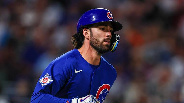 Jun 24, 2026; New York City, New York, USA;  Chicago Cubs shortstop Dansby Swanson (7) hits an RBI triple during the sixth inning against the New York Mets  at Citi Field. Mandatory Credit: Vincent Carchietta-Imagn Images