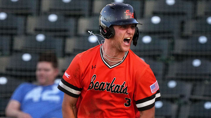 May 26, 2023; Mesa, AZ, USA; Sam Houston Bearkats' Walker Janek (3) celebrates his 3-run home run against the GCU Lobos during their WAC Tournament game at Hohokam Stadium.