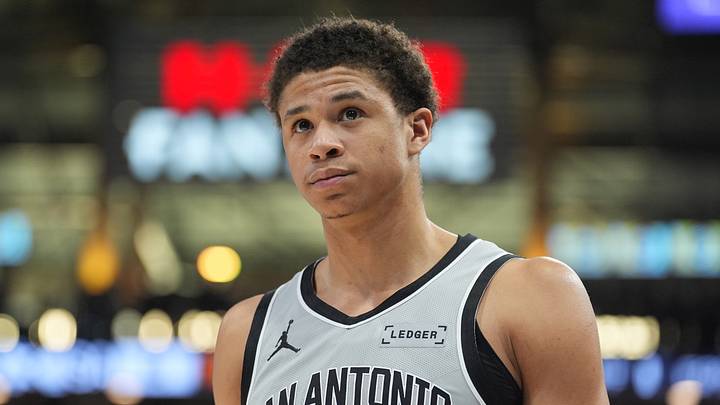 Feb 7, 2026; San Antonio, Texas, USA;  San Antonio Spurs forward Carter Bryant (11) looks up in the first half against the Dallas Mavericks at Frost Bank Center. Mandatory Credit: Daniel Dunn-Imagn Images