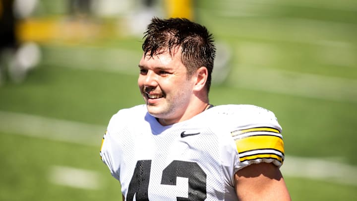 Apr 26, 2025; Iowa City, IA, USA; Iowa linebacker Karson Sharar (43) talks with teammates during a spring NCAA football open practice at Kinnick Stadium. Mandatory Credit: Joseph Cress/For the Register