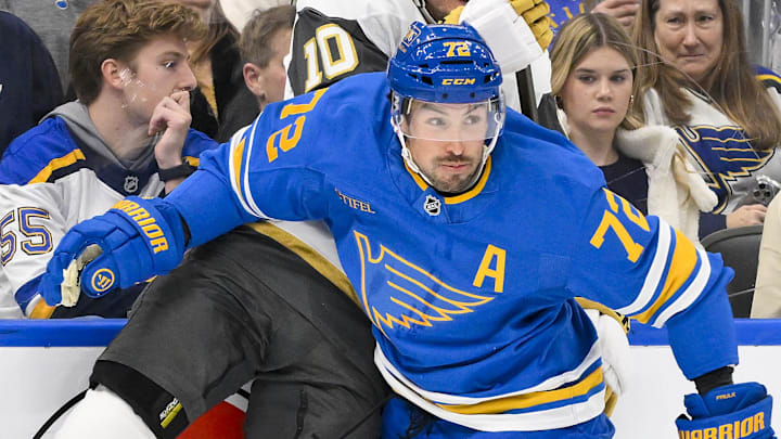 Jan 2, 2026; St. Louis, Missouri, USA; St. Louis Blues defenseman Justin Faulk (72) checks Vegas Golden Knights center Colton Sissons (10) during the first period at Enterprise Center. Mandatory Credit: Jeff Curry-Imagn Images