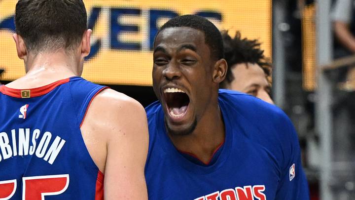Dec 12, 2025; Detroit, Michigan, USA; Detroit Pistons center Jalen Duren (0) and forward Duncan Robinson (55) celebrate on the bench after the Pistons began to pull away from the Atlanta Hawks in the fourth quarter at Little Caesars Arena. Mandatory Credit: Lon Horwedel-Imagn Images