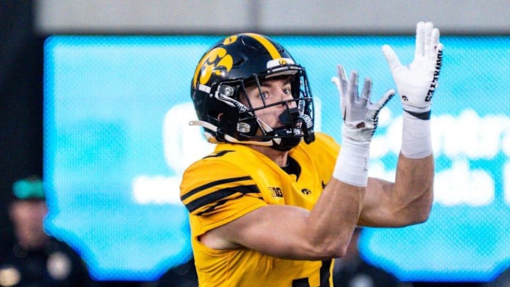 Iowa defensive back Cooper DeJean (3) catches a punt at Kinnick Stadium on Saturday, October 21, 2023 in Iowa City. DeJean returned the punt for a touchdown and it was later called back after review ruled he fair-caught the punt.