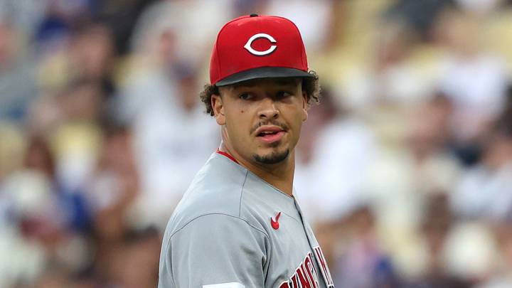 Sep 7, 2026; Los Angeles, California, USA;  Cincinnati Reds starting pitcher Chase Burns (26) walks to the dugout after striking out Los Angeles Dodgers catcher Hunter Feduccia (not pictured) during the second inning at Dodger Stadium.  Mandatory Credit: Kiyoshi Mio-Imagn Images