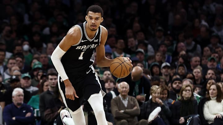 Jan 17, 2024; Boston, Massachusetts, USA; San Antonio Spurs center Victor Wembanyama (1) brings the ball up the court against the Boston Celtics during the second half at TD Garden.