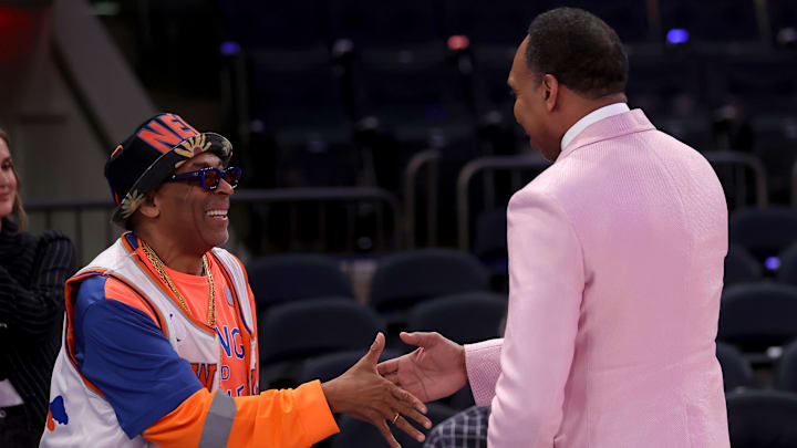 May 16, 2025; New York, New York, USA; American director Spike Lee (left) shakes hands with ESPN personality Stephen A. Smith before game six in the second round of the 2025 NBA Playoffs between the New York Knicks and the Boston Celtics at Madison Square Garden. Mandatory Credit: Brad Penner-Imagn Images
