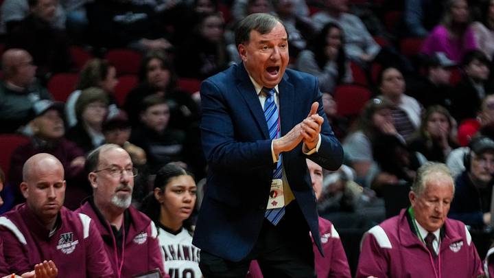 Waterloo West head coach Dr. Anthony Pappas cheers during the 5A quarterfinals of the Iowa high school girls state basketball tournament at Wells Fargo Arena in Des Moines on Monday, Feb. 27, 2023. The Jaguars defeated the Wahawks, 60-51. Waterloo West head coach Dr. Anthony Pappas cheers during the 5A quarterfinals of the Iowa high school girls state basketball tournament at Wells Fargo Arena in Des Moines on Monday, Feb. 27, 2023. The Jaguars defeated the Wahawks, 60-51.