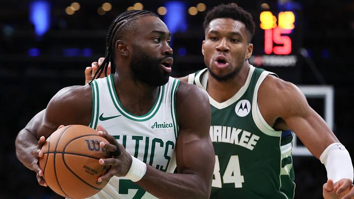 Oct 28, 2024; Boston, Massachusetts, USA; Boston Celtics forward Jaylen Brown (7) drives to the basket defended by Milwaukee Bucks forward Giannis Antetokounmpo (34) during the second half at TD Garden. Mandatory Credit: Paul Rutherford-Imagn Images