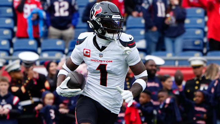 Oct 13, 2024; Foxborough, Massachusetts, USA; Houston Texans wide receiver Stefon Diggs (1) warms up prior to the game against the New England Patriots at Gillette Stadium. Mandatory Credit: Gregory Fisher-Imagn Images
