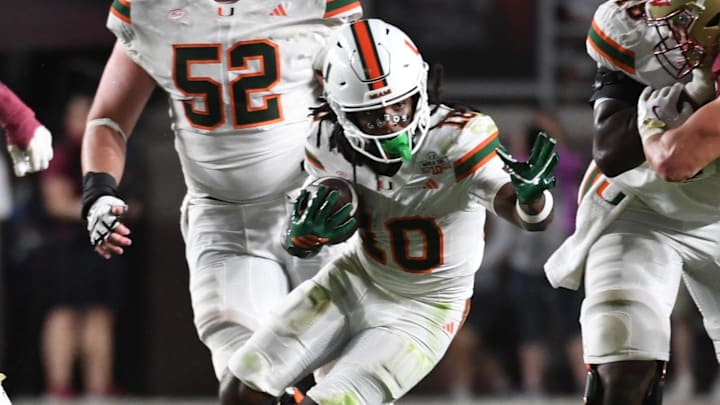 Oct 4, 2025; Tallahassee, Florida, USA; Miami Hurricanes wide receiver Malachi Toney (10) runs against Florida State Seminoles linebacker Blake Nichelson (20) during the second half at Doak S. Campbell Stadium. Mandatory Credit: Robert Myers-Imagn Images