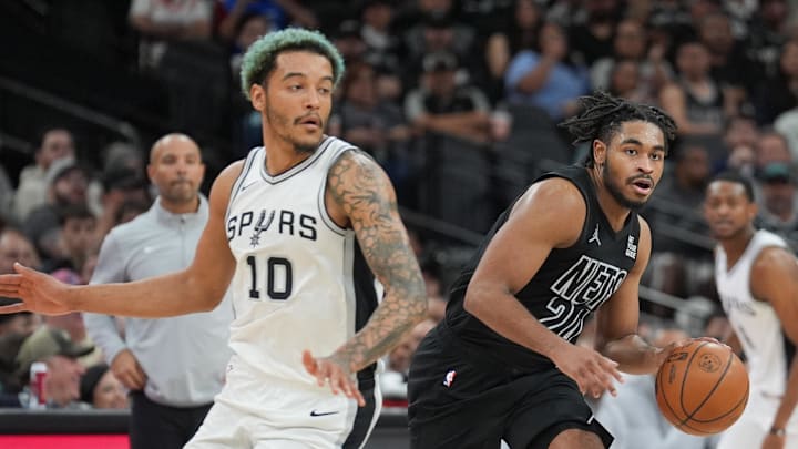 Mar 4, 2025; San Antonio, Texas, USA; Brooklyn Nets guard Cam Thomas (24) dribbles against San Antonio Spurs forward Jeremy Sochan (10) in the second half at Frost Bank Center. Mandatory Credit: Daniel Dunn-Imagn Images Mar 4, 2025; San Antonio, Texas, USA; Brooklyn Nets guard Cam Thomas (24) dribbles against San Antonio Spurs forward Jeremy Sochan (10) in the second half at Frost Bank Center. Mandatory Credit: Daniel Dunn-Imagn Images