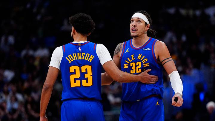 Mar 22, 2026; Denver, Colorado, USA; Denver Nuggets forward Cameron Johnson (23) and forward Aaron Gordon (32) react the third quarter against the Portland Trail Blazers at Ball Arena. Mar 22, 2026; Denver, Colorado, USA; Denver Nuggets forward Cameron Johnson (23) and forward Aaron Gordon (32) react the third quarter against the Portland Trail Blazers at Ball Arena.