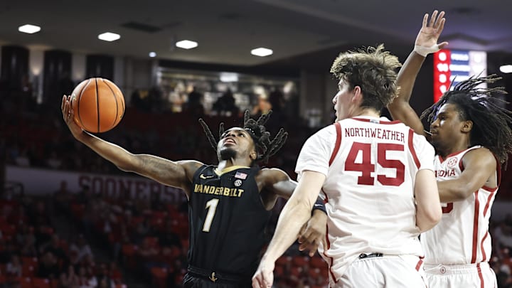 Vanderbilt Commodores guard Jason Edwards (1) shoots the ball against the Oklahoma Sooners during the first half at Lloyd Noble Center. Vanderbilt Commodores guard Jason Edwards (1) shoots the ball against the Oklahoma Sooners during the first half at Lloyd Noble Center.