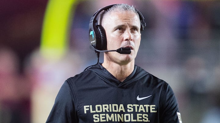Florida State Seminoles head coach Mike Norvell walks down the field. The Miami Hurricanes lead the Florida State Seminoles 14-3 at the half on Saturday, Oct. 4, 2025. Florida State Seminoles head coach Mike Norvell walks down the field. The Miami Hurricanes lead the Florida State Seminoles 14-3 at the half on Saturday, Oct. 4, 2025.