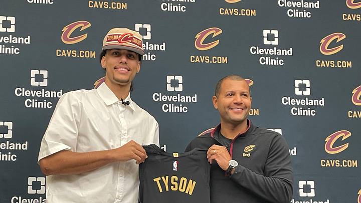 Cavaliers first-round draft pick Jaylon Tyson and president of basketball operations Koby Altman hold a jersey during Tyson's introductory news conference Thursday, June 27, in Independence. The Cavs chose Tyson 20th overall. Cavaliers first-round draft pick Jaylon Tyson and president of basketball operations Koby Altman hold a jersey during Tyson's introductory news conference Thursday, June 27, in Independence. The Cavs chose Tyson 20th overall.