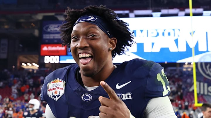 Dec 31, 2024; Glendale, AZ, USA; Penn State Nittany Lions running back Kaytron Allen (13) reacts after defeating the Boise State Broncos in the Fiesta Bowl at State Farm Stadium. Mandatory Credit: Mark J. Rebilas-Imagn Images