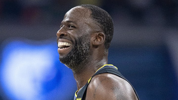 Nov 15, 2024; San Francisco, California, USA; Golden State Warriors forward Draymond Green (23) smiles as he returns to the bench during the first quarter against the Memphis Grizzlies at Chase Center. Mandatory Credit: D. Ross Cameron-Imagn Images