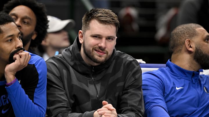 Jan 27, 2025; Dallas, Texas, USA; Dallas Mavericks guard Luka Doncic looks on from the team bench during the second quarter against the Washington Wizards at the American Airlines Center. Mandatory Credit: Jerome Miron-Imagn Images