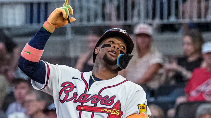 Sep 8, 2026; Cumberland, Georgia, USA; Atlanta Braves right fielder Ronald Acuna Jr. (13) reacts after hitting a single against the Tampa Bay Rays during the first inning at Truist Park. Mandatory Credit: Dale Zanine-Imagn Images