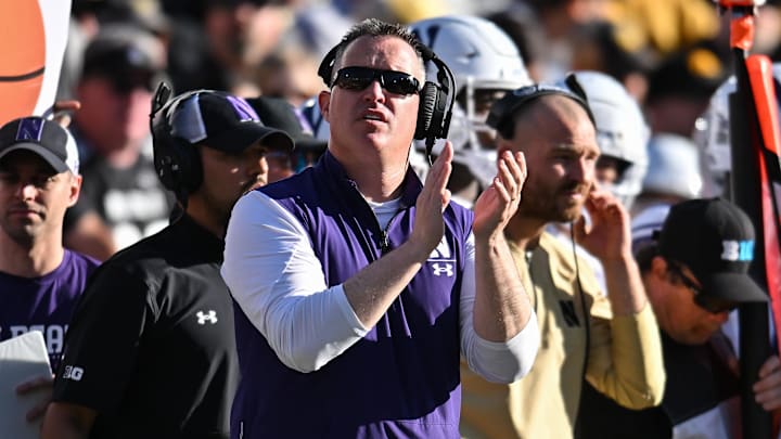 Oct 29, 2022; Iowa City, Iowa, USA; Northwestern Wildcats head coach Pat Fitzgerald looks on against the Iowa Hawkeyes during the second quarter at Kinnick Stadium. Mandatory Credit: Jeffrey Becker-Imagn Images Oct 29, 2022; Iowa City, Iowa, USA; Northwestern Wildcats head coach Pat Fitzgerald looks on against the Iowa Hawkeyes during the second quarter at Kinnick Stadium. Mandatory Credit: Jeffrey Becker-Imagn Images