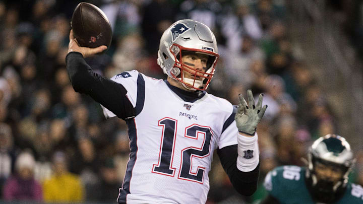 New England's Tom Brady (12) throws downfield against the Eagles on Nov. 17, 2019. New England's Tom Brady (12) throws downfield against the Eagles on Nov. 17, 2019.