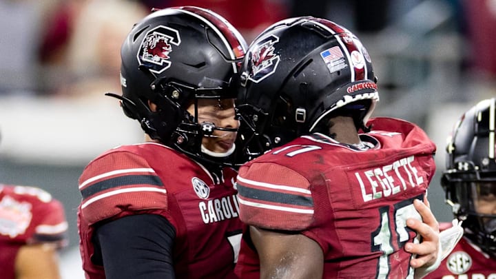 South Carolina football quarterback Spencer Rattler and wide receiver Xavier Legette celebrating after a touchdown connection