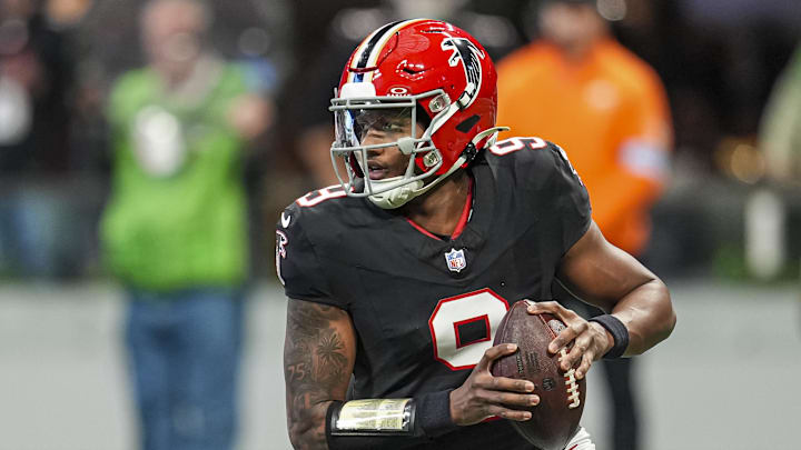 Atlanta Falcons quarterback Michael Penix Jr. rolls out of the pocket, adding a new dimension to the offense.