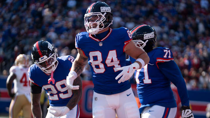 New York Giants tight end Theo Johnson (84) celebrates with teammates after scoring the first touchdown during a week 9 game between New York Giants and San Francisco 49ers at MetLife Stadium on Sunday, Nov. 2, 2025.
