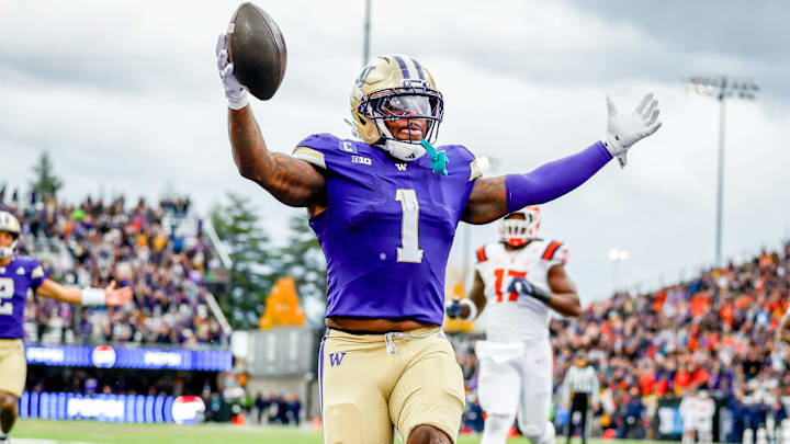 October 25, 2025, Seattle, Washington, USA: Washington Huskies running back Jonah Coleman (1) scores during the game between the Illinois Fighting Illini and the Washington Huskies in the 2025 Big 10 Conference game at Husky Stadium, Seattle, Washington.