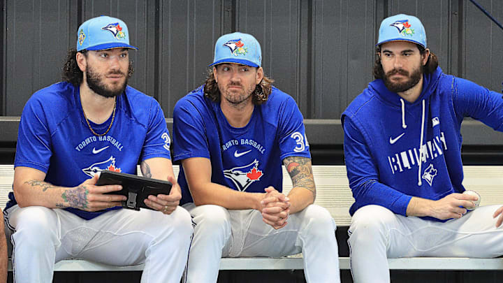 Feb 11, 2026; Dunedin, FL, USA; Toronto Blue Jays pitcher Kevin Gausman (34), pitcher Dylan Cease (84), pitcher Cody Ponce (37) watch the bullpen pitchers for spring training practice at Blue Jays Player Development Complex. Mandatory Credit: Kim Klement Neitzel-Imagn Images Feb 11, 2026; Dunedin, FL, USA; Toronto Blue Jays pitcher Kevin Gausman (34), pitcher Dylan Cease (84), pitcher Cody Ponce (37) watch the bullpen pitchers for spring training practice at Blue Jays Player Development Complex. Mandatory Credit: Kim Klement Neitzel-Imagn Images
