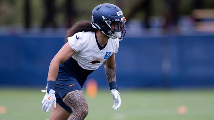 Denver Broncos safety Talanoa Hufanga (9) practices during OTAs at Broncos Park Powered by CommonSpirit. Denver Broncos safety Talanoa Hufanga (9) practices during OTAs at Broncos Park Powered by CommonSpirit.