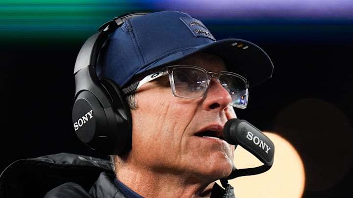 Jan 11, 2026; Foxborough, MA, USA; Los Angeles Chargers head coach Jim Harbaugh looks on during the second quarter against the New England Patriots in an AFC Wild Card Round game at Gillette Stadium. Mandatory Credit: David Butler II-Imagn Images Jan 11, 2026; Foxborough, MA, USA; Los Angeles Chargers head coach Jim Harbaugh looks on during the second quarter against the New England Patriots in an AFC Wild Card Round game at Gillette Stadium. Mandatory Credit: David Butler II-Imagn Images