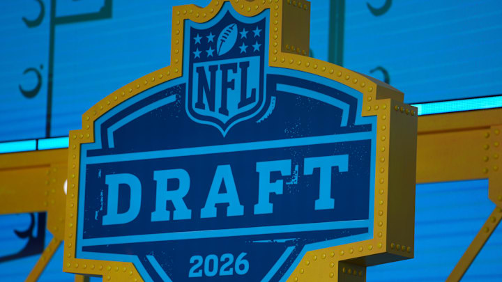 The 2026 NFL Draft logo on the theater stage at Acrisure Stadium.