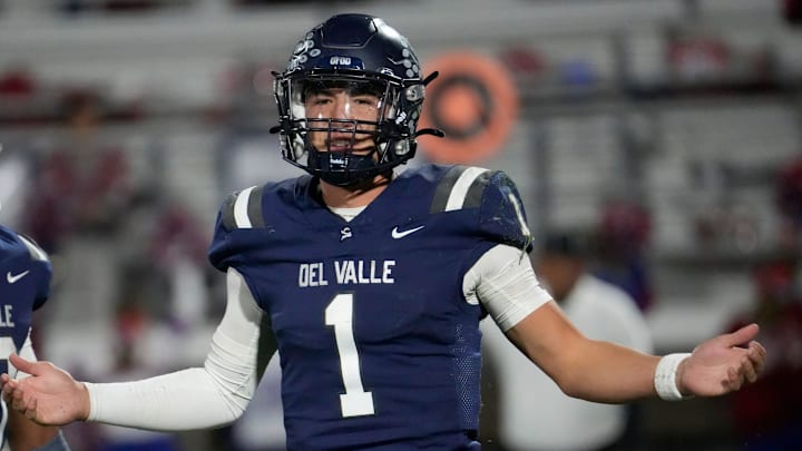 Del Valle High School's Jake Fette talks to his sideline during their game against Cooper High School at Del Valle High School on Nov. 14, 2024. Del Valley won their opening playoff game.