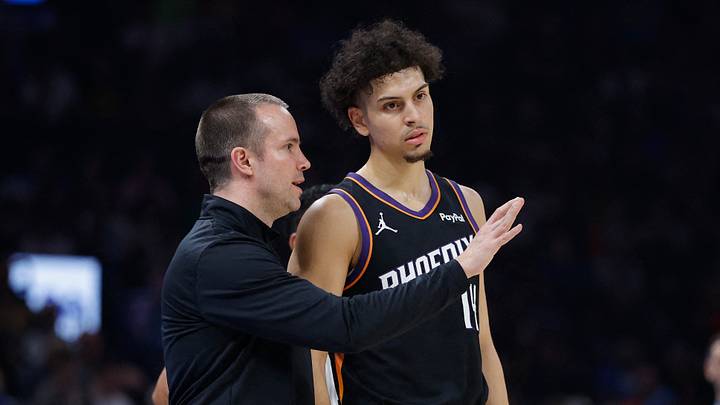 Phoenix Suns head coach Jordan Ott talks to Phoenix Suns guard Koby Brea (14) during the first half at Paycom Center.