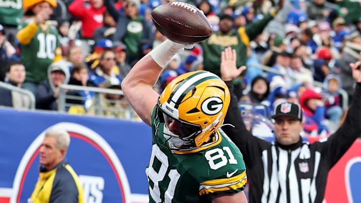 Green Bay Packers tight end Josh Whyle (81) celebrates after catching a touchdown pass against the New York Giants. Green Bay Packers tight end Josh Whyle (81) celebrates after catching a touchdown pass against the New York Giants.