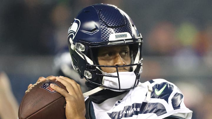 Seattle Seahawks quarterback Geno Smith warms up for a game.
