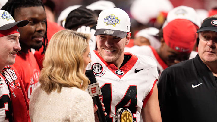 Dec 6, 2025; Atlanta, GA, USA; Georgia Bulldogs quarterback Gunner Stockton (14) speaks to the media after the game against the Alabama Crimson Tide during the 2025 SEC Championship game at Mercedes-Benz Stadium. Mandatory Credit: Dale Zanine-Imagn Images