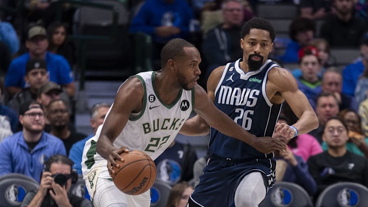 Dec 9, 2022; Dallas, Texas, USA; Milwaukee Bucks forward Khris Middleton (22) and Dallas Mavericks guard Spencer Dinwiddie (26) in action during the game between the Dallas Mavericks and the Milwaukee Bucks at the American Airlines Center. Mandatory Credit: Jerome Miron-Imagn Images