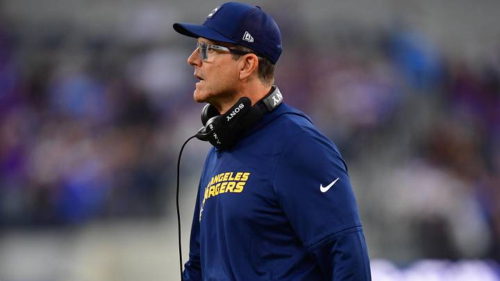 Oct 23, 2025; Inglewood, California, USA; Los Angeles Chargers head coach Jim Harbaugh reacts during the first half at SoFi Stadium. Mandatory Credit: Gary A. Vasquez-Imagn Images