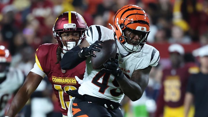 Aug 18, 2025; Landover, Maryland, USA; Cincinnati Bengals linebacker Barrett Carter (49) catches a pass intended for Washington Commanders wide receiver K.J. Osborn (13) during the first half at Northwest Stadium. Mandatory Credit: Amber Searls-Imagn Images Aug 18, 2025; Landover, Maryland, USA; Cincinnati Bengals linebacker Barrett Carter (49) catches a pass intended for Washington Commanders wide receiver K.J. Osborn (13) during the first half at Northwest Stadium. Mandatory Credit: Amber Searls-Imagn Images