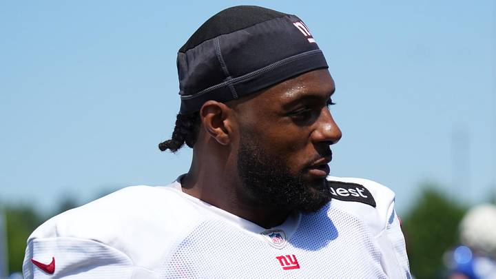 Jul 26, 2024; East Rutherford, NJ, USA; New York Giants linebacker Kayvon Thibodeaux (5) walks the sideline during training camp at Quest Diagnostics Training Center. Mandatory Credit: Lucas Boland-Imagn Images