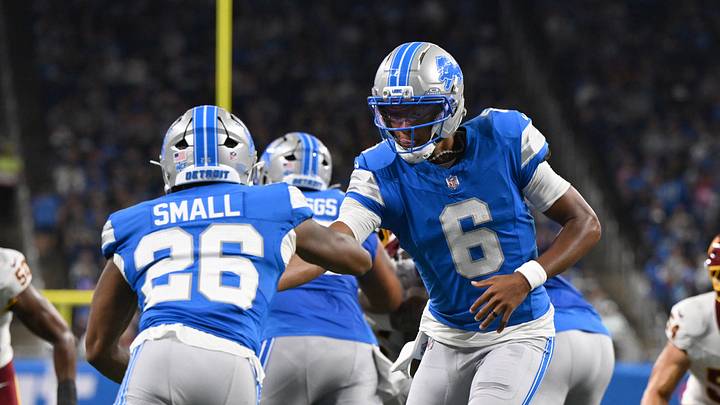 Detroit Lions quarterback Joshua Dobbs (6) hands the ball off to Detroit Lions running back Jabari Small (26) Detroit Lions quarterback Joshua Dobbs (6) hands the ball off to Detroit Lions running back Jabari Small (26)