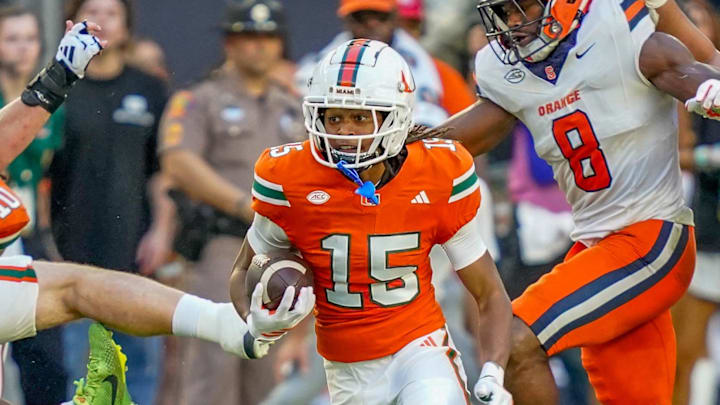 Nov 8, 2025; Miami Gardens, Florida, USA; Miami Hurricanes wide receiver Daylyn Upshaw (15) rushes after a reception against the Syracuse Orange during the second quarter at Hard Rock Stadium. Mandatory Credit: Jeff Romance-Imagn Images