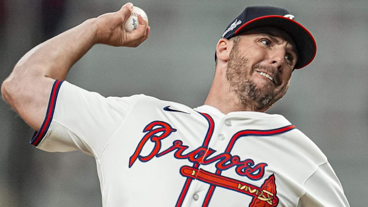 Atlanta Braves relief pitcher Kevin Herget (57) pitches against the Los Angeles Angels during the ninth inning at Truist Park.